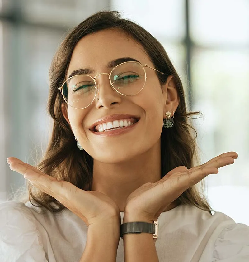 Woman with glasses smiling | Dentist in Georgetown